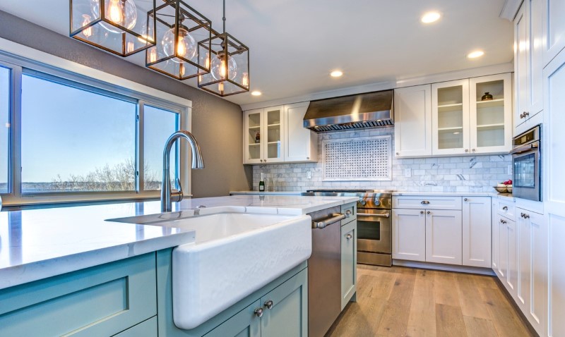 Kitchen with pendant lights and recessed lights